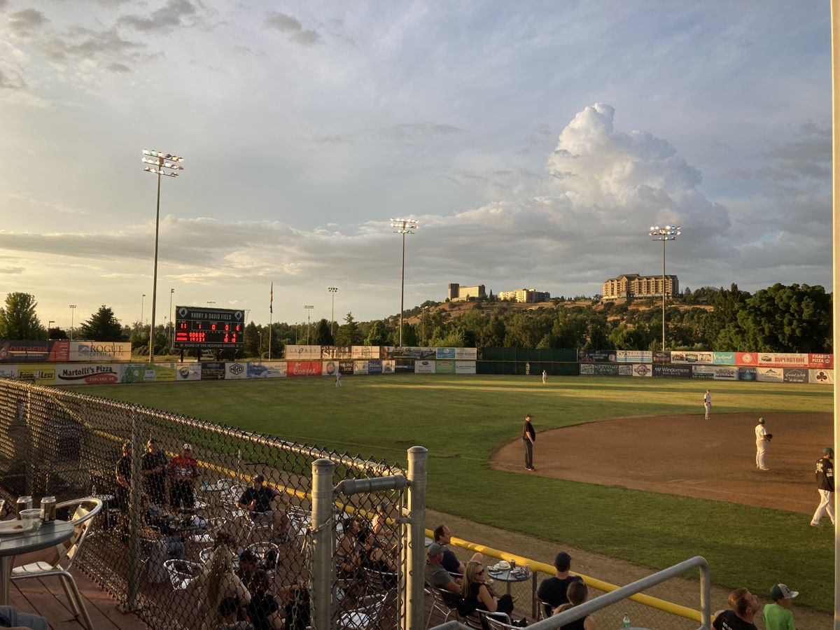An evening Medford Rogues baseball game at Harry and David Field